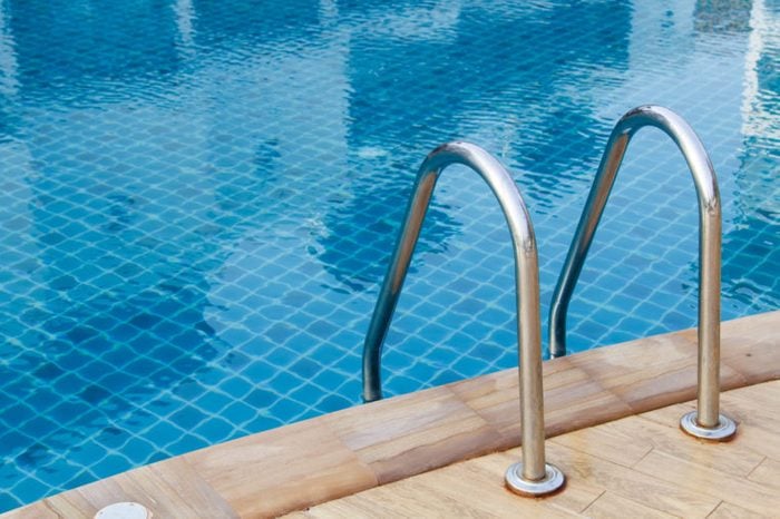 Grab bars ladder in blue the swimming pool