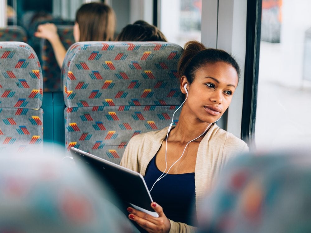 Young attractive woman on a bus