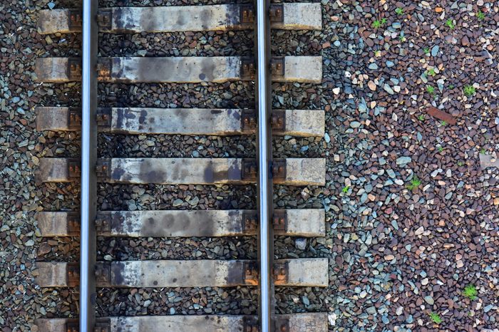 Fragment of the old railway close-up. View from above. Background freight transport