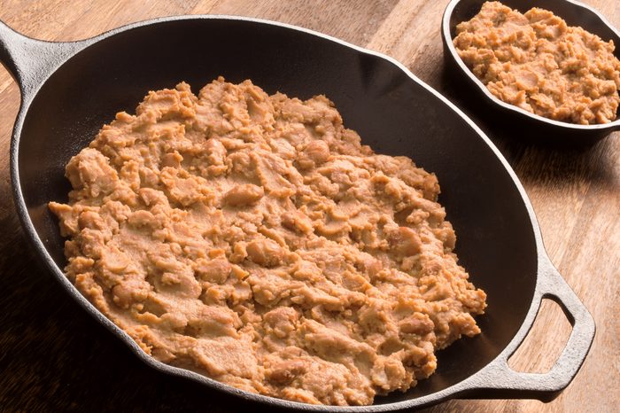 close up of a pan of refried beans