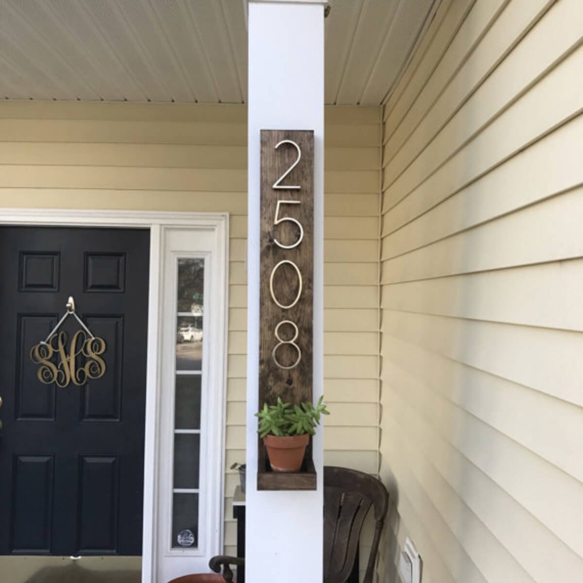 house numbers with plant stand