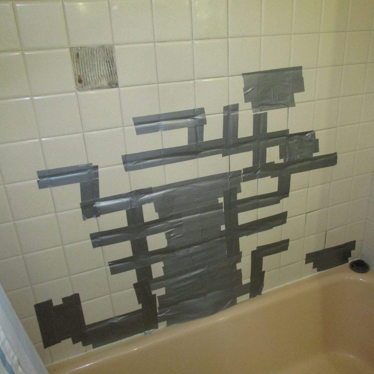 Duct-tape-wall bathroom