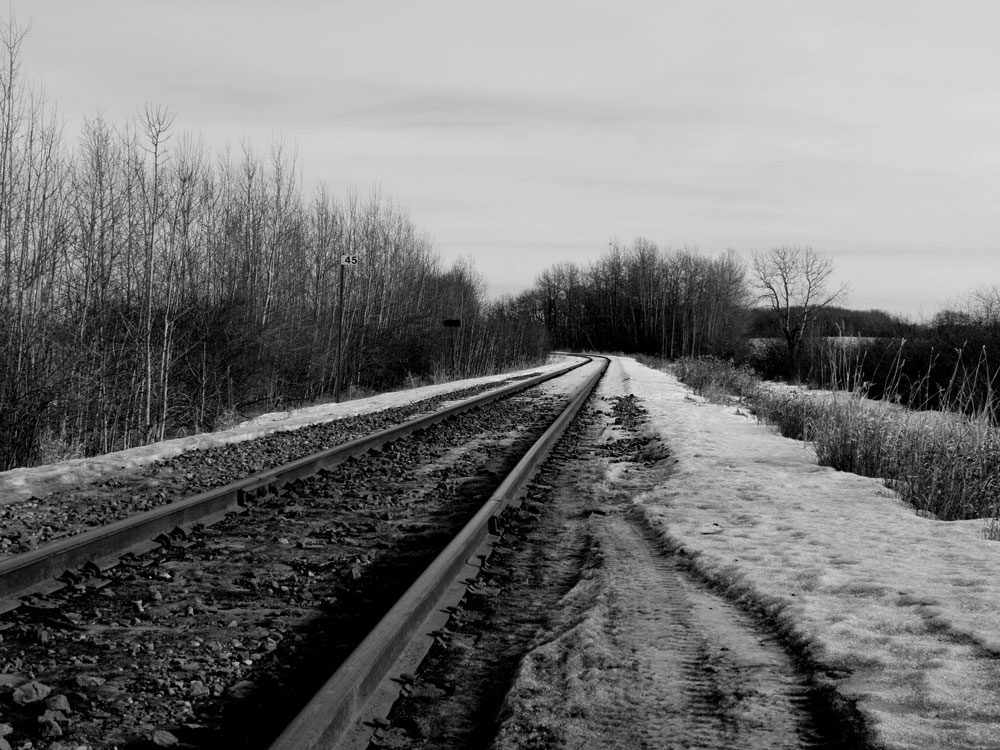 black and white train tracks