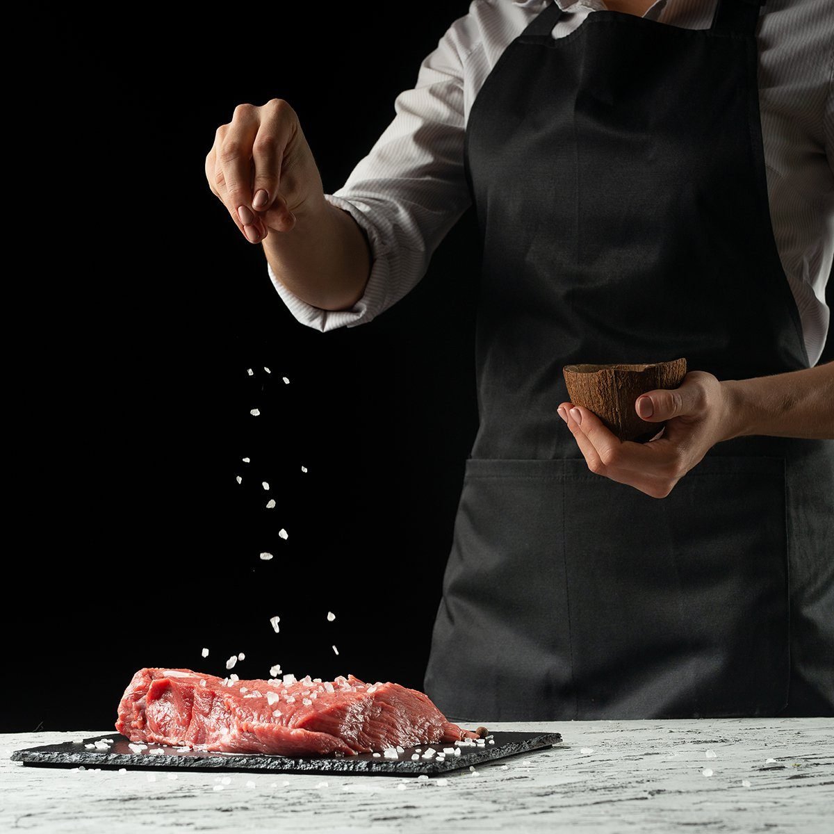 Preparation of the chef by steak cook.