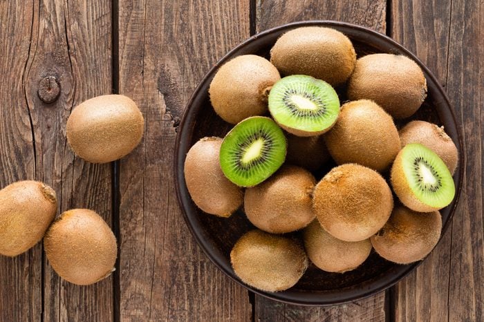 Kiwi fruit on wooden rustic table, ingredient for detox smoothie