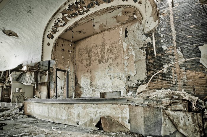 Abandoned music theater ballroom in Detroit Michigan. It has burned and it's once beautiful facade is crumbling away.