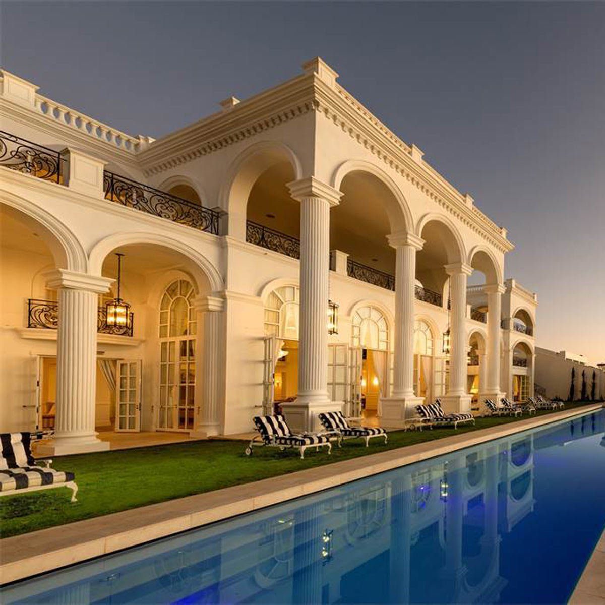 Mansion with a pool in front in South Africa