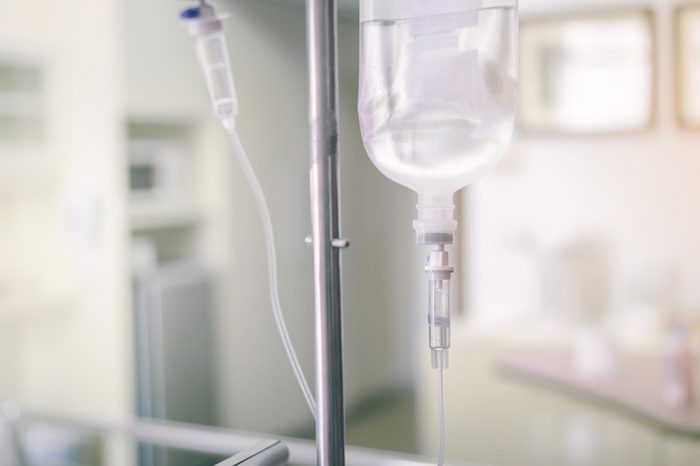 bag of saline on a pole in a hospital