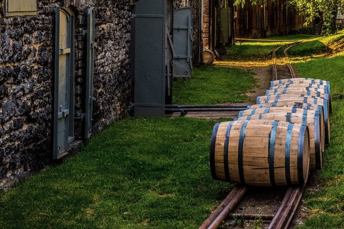 Newly filled bourbon barrels on rail to be transported to warehouse for aging in Kentucky. 