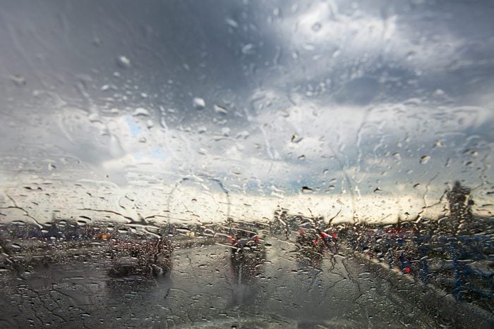 $1 solutions - rainy window in traffic