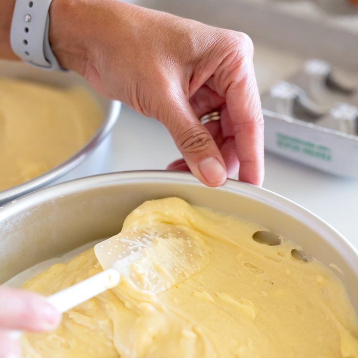 cake baking tips - Yellow Cake Mix Spread in Pan; Shutterstock ID 1485217412; Job (TFH, TOH, RD, BNB, CWM, CM): TOH