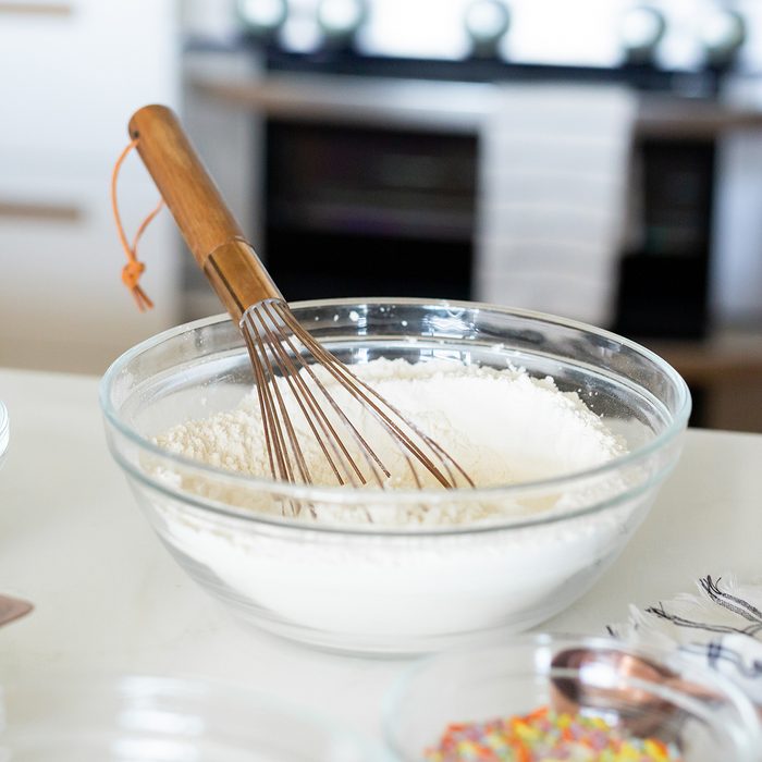 cake baking tips - Mixing with a Hand Whisk; Shutterstock ID 1485243398; Job (TFH, TOH, RD, BNB, CWM, CM): TOH