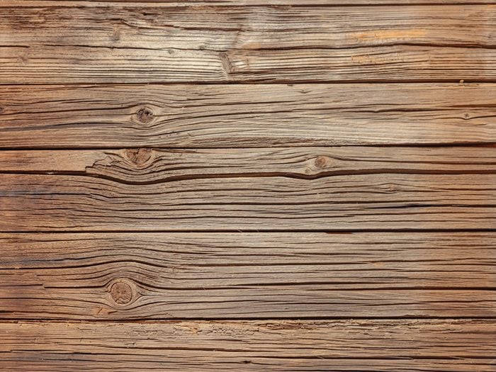 $1 solutions - Full frame of old splintered brown wood background with copy space