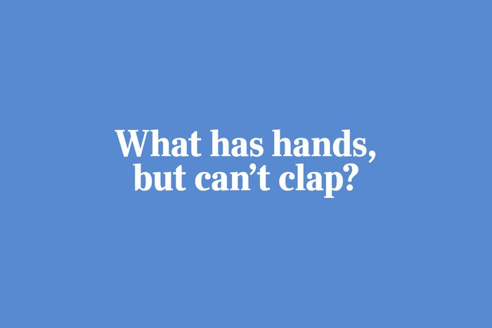 What has hands, but can't clap?