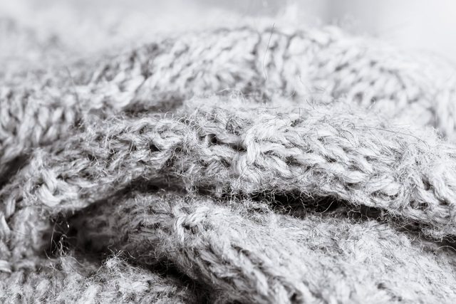 Grey wool knitwear as a detailed abstract