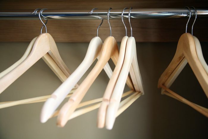 empty hangers for clothes on rail, after sale