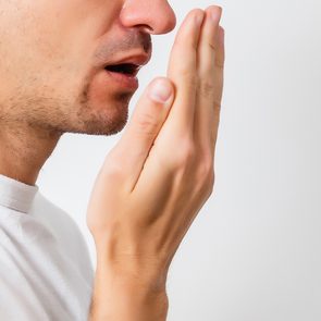 Body Odour - Man Smelling Breath