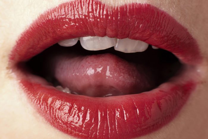 Close-up of woman's red lips