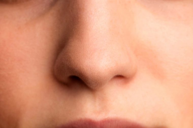 body odours - Close-up of woman's nose
