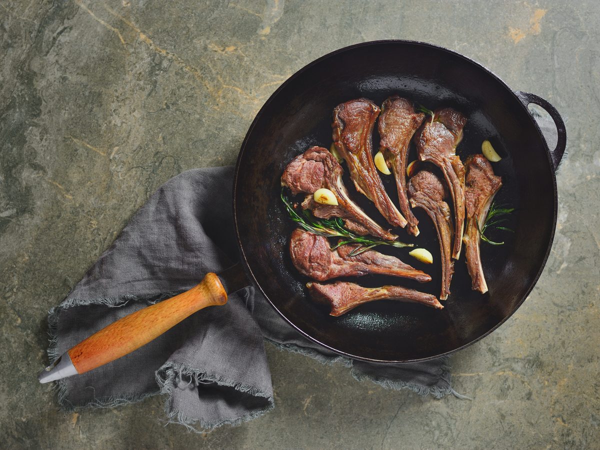 Roasted lamb chops in a cast-iron pan