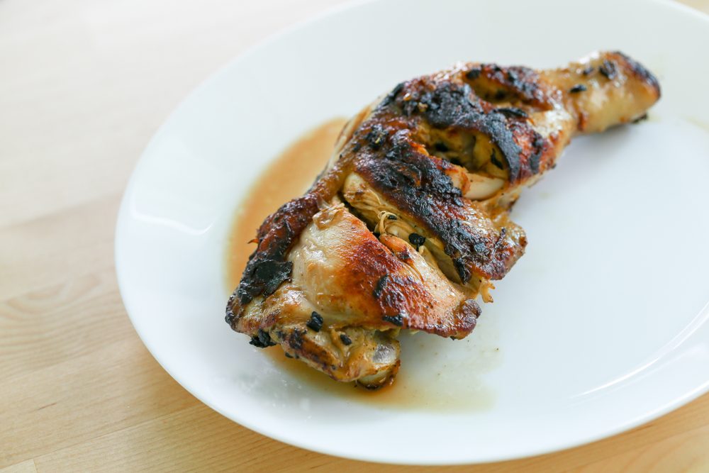 Grilled chicken burns on dish.