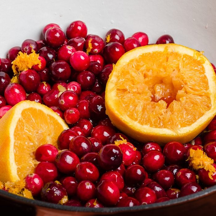 Cranberries and orange for making homemade cranberry sauce; Shutterstock ID 164156969; Job (TFH, TOH, RD, BNB, CWM, CM): TOH