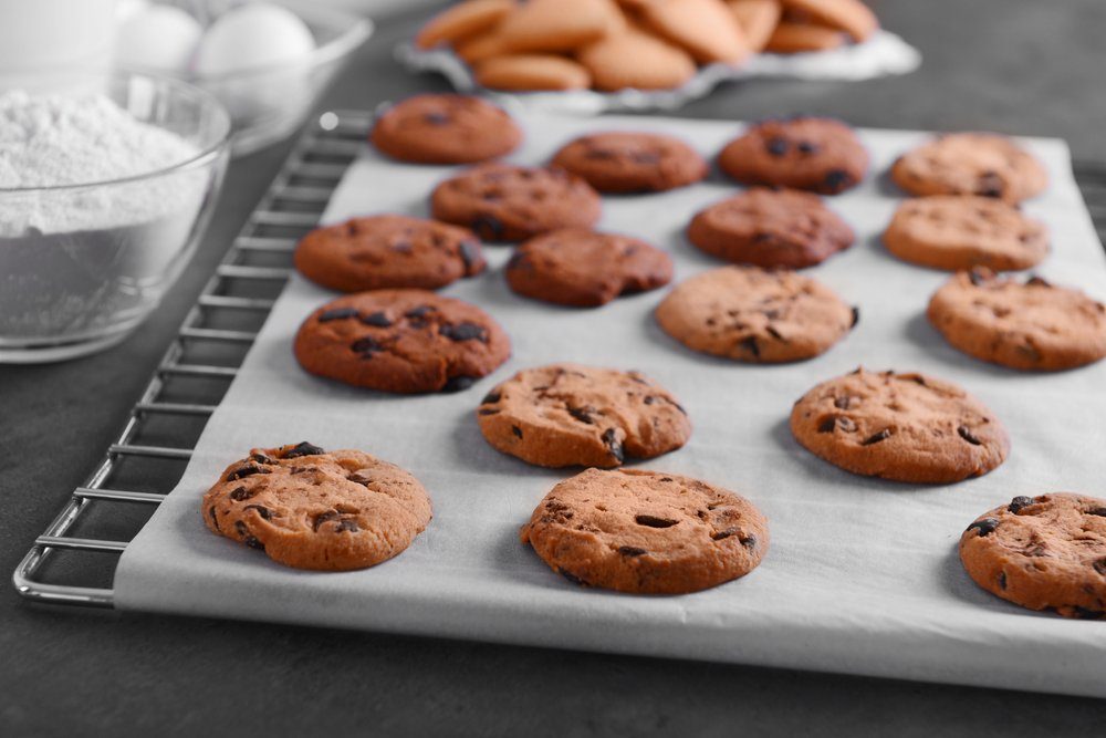 cooking mistakes - Freshly baked cookies on tray rack