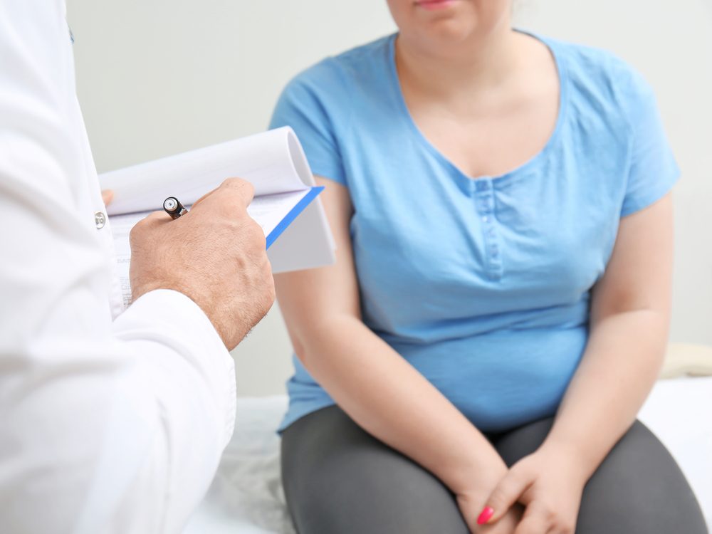 Woman discussing tests with doctor