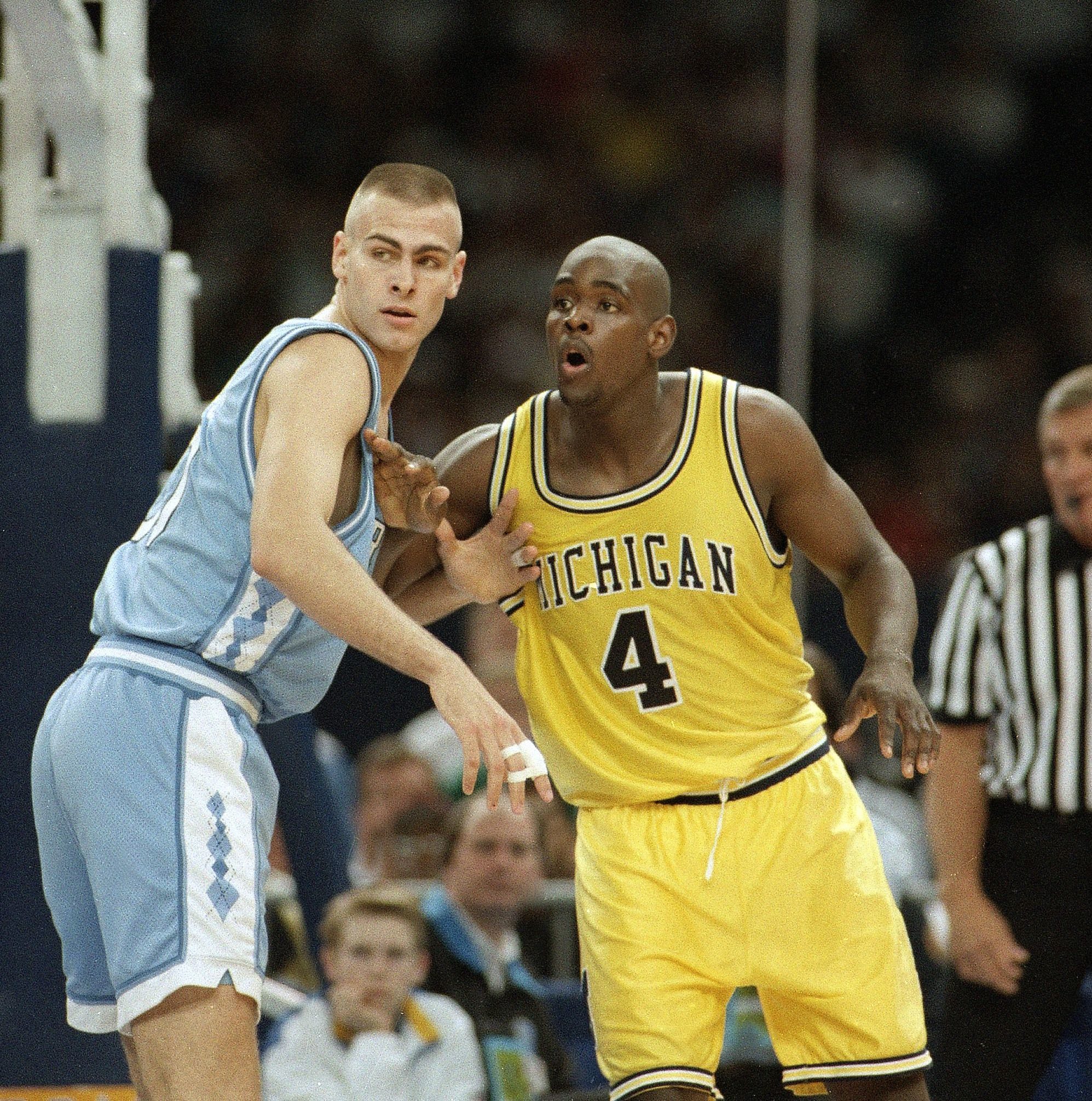 Mandatory Credit: Photo by David Longstreath/AP/Shutterstock (6566326a) Montross Webber North Carolina's Eric Montross, left, guards Michigan's Chris Webber during their Final Four championship game at the Superdome in New Orleans NCAA MONTROSS WEBBER 1993, NEW ORLEANS, USA