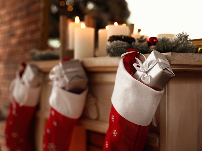 Holiday stockings hung on the mantel