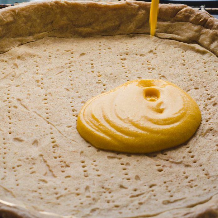 holiday cooking tips - Pie crust filling with pumpink filling; Shutterstock ID 1433758553; Job (TFH, TOH, RD, BNB, CWM, CM): TOH