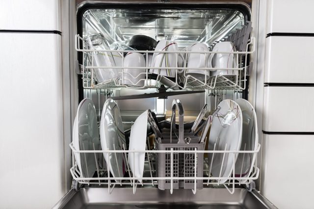 Photo Of Utensils Arranged In Dishwasher In Kitchen