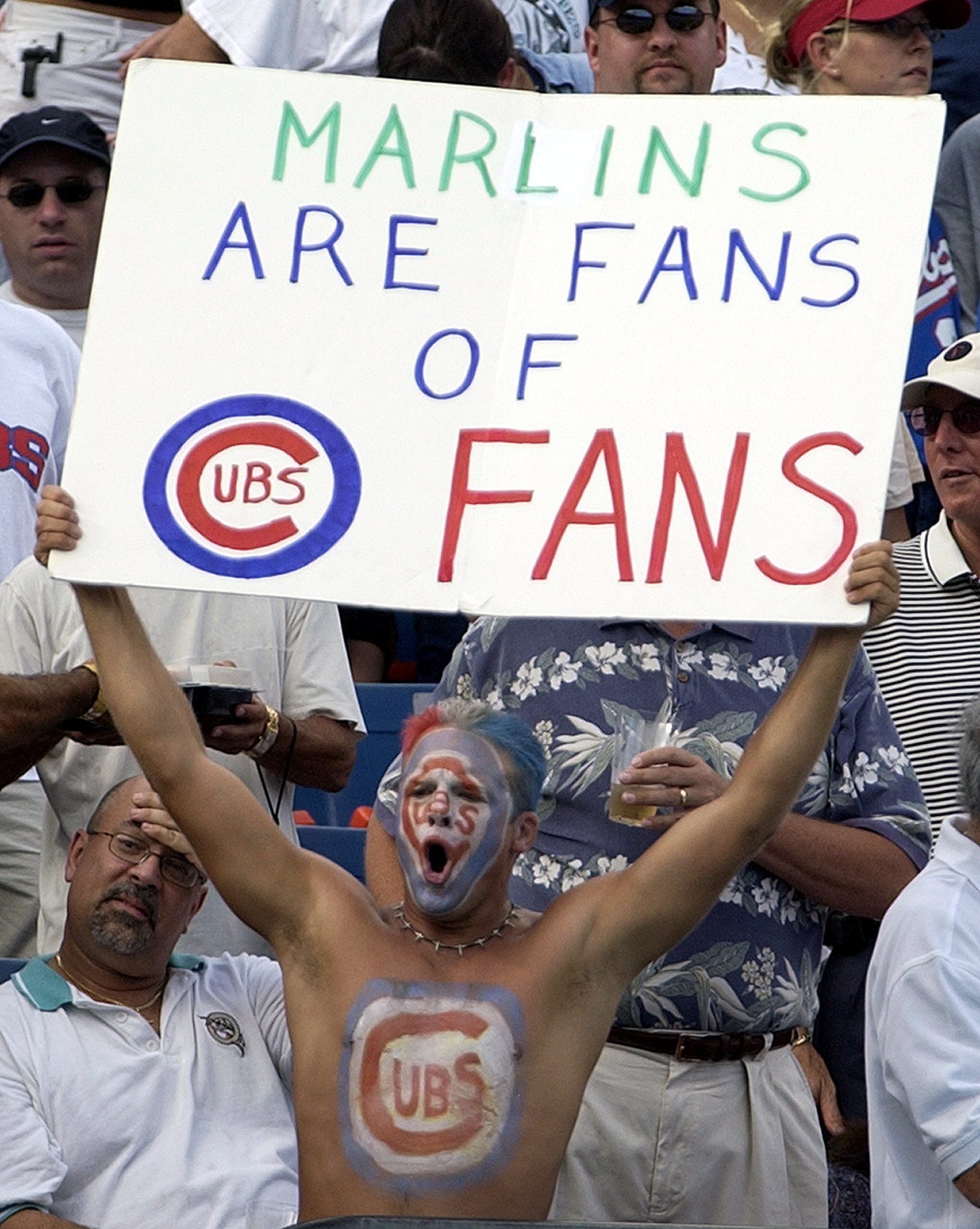 Mandatory Credit: Photo by Rhona Wise/EPA/Shutterstock (7912107a) A Chicago Cubs Fan Shows His Feelings with a Sign and Body Paint During Game Five of the National League Championship Series Against the Florida Marlins Sunday 12 October 2003 at Pro Player Stadium in Miami Florida Usa Baseball Cubs Marlins Fan Support - Oct 2003