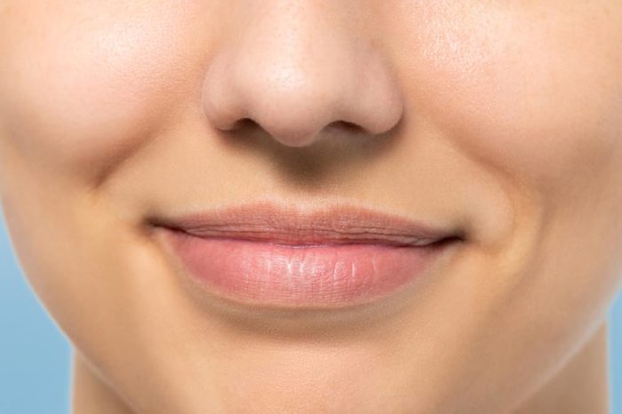 close up of woman's face, mouth, and nose