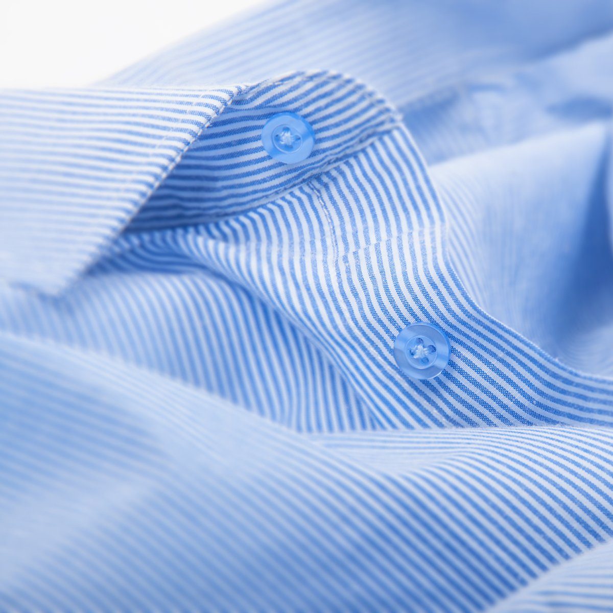 blue striped button down shirt, macro shot