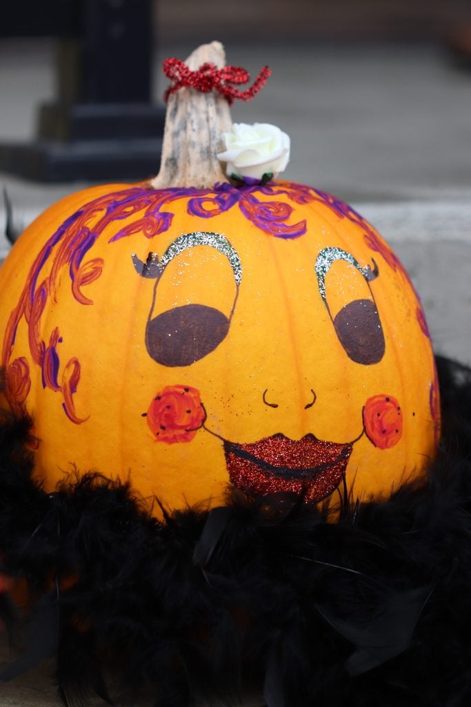 Pumpkin with smiling, made-up face