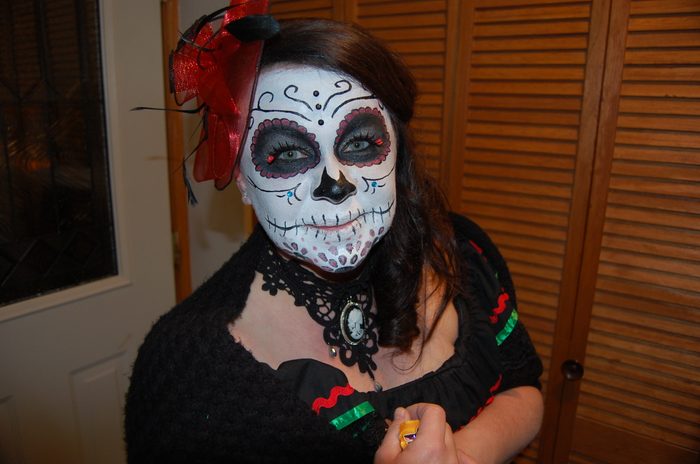 A girl in artful corpse makeup