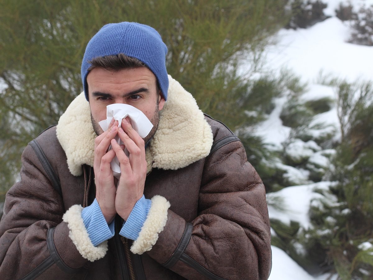 Hilarious tweets - man blowing nose cold in winter
