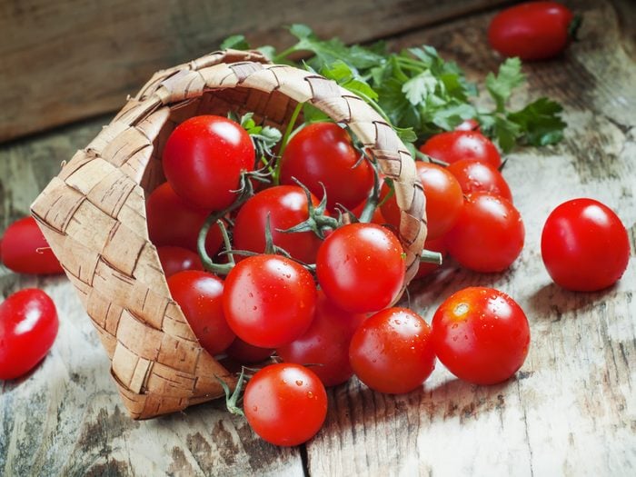 Tomatoes falling out of basket