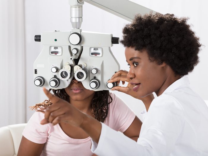 How to live to 100 - Woman and optometrist in eye exam
