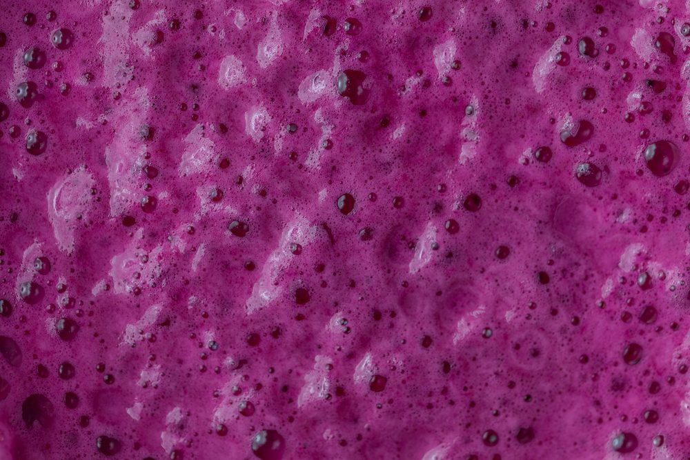 Extreme Closeup of Purple Beets Juice Texture
