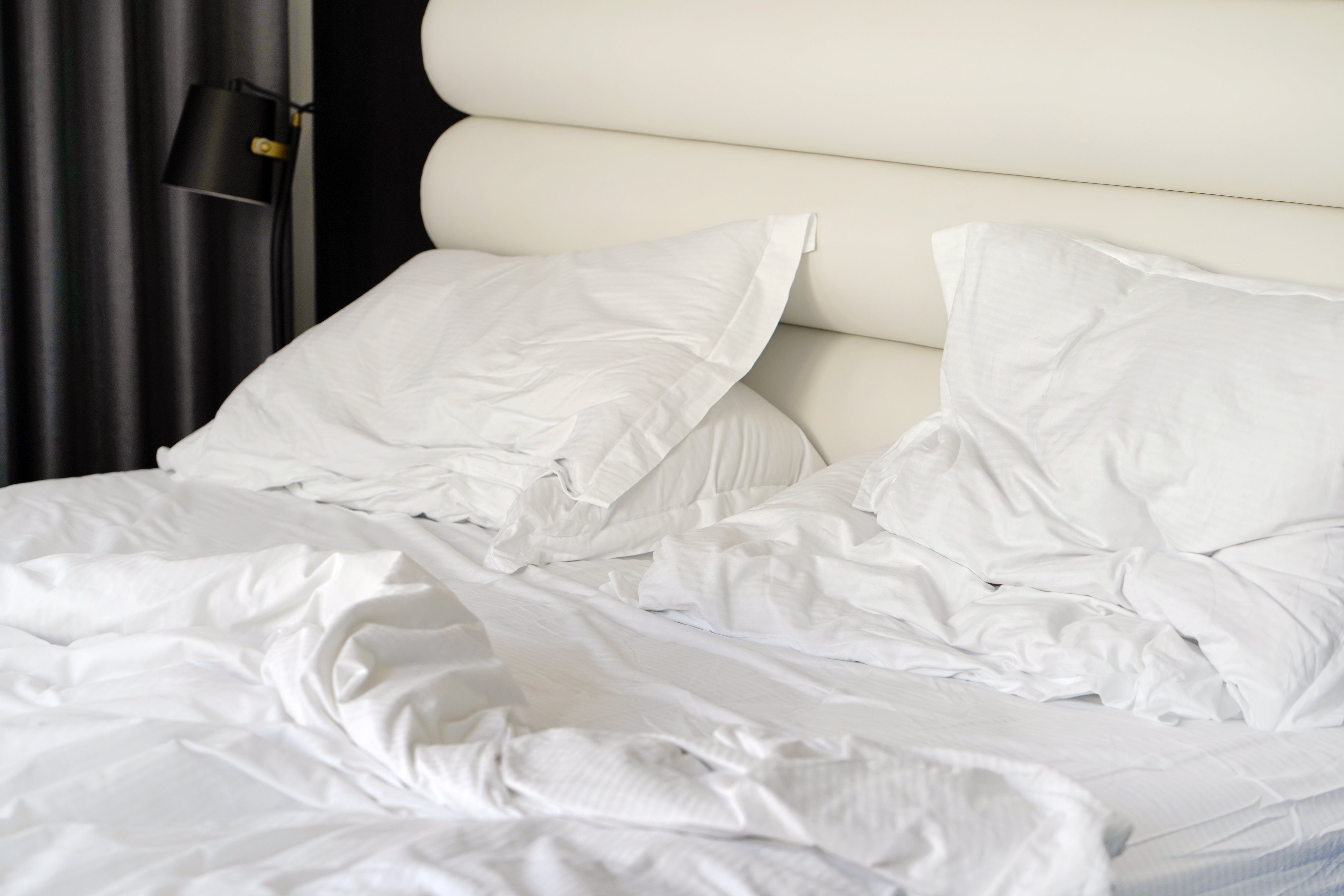 White bedsheets in hotel