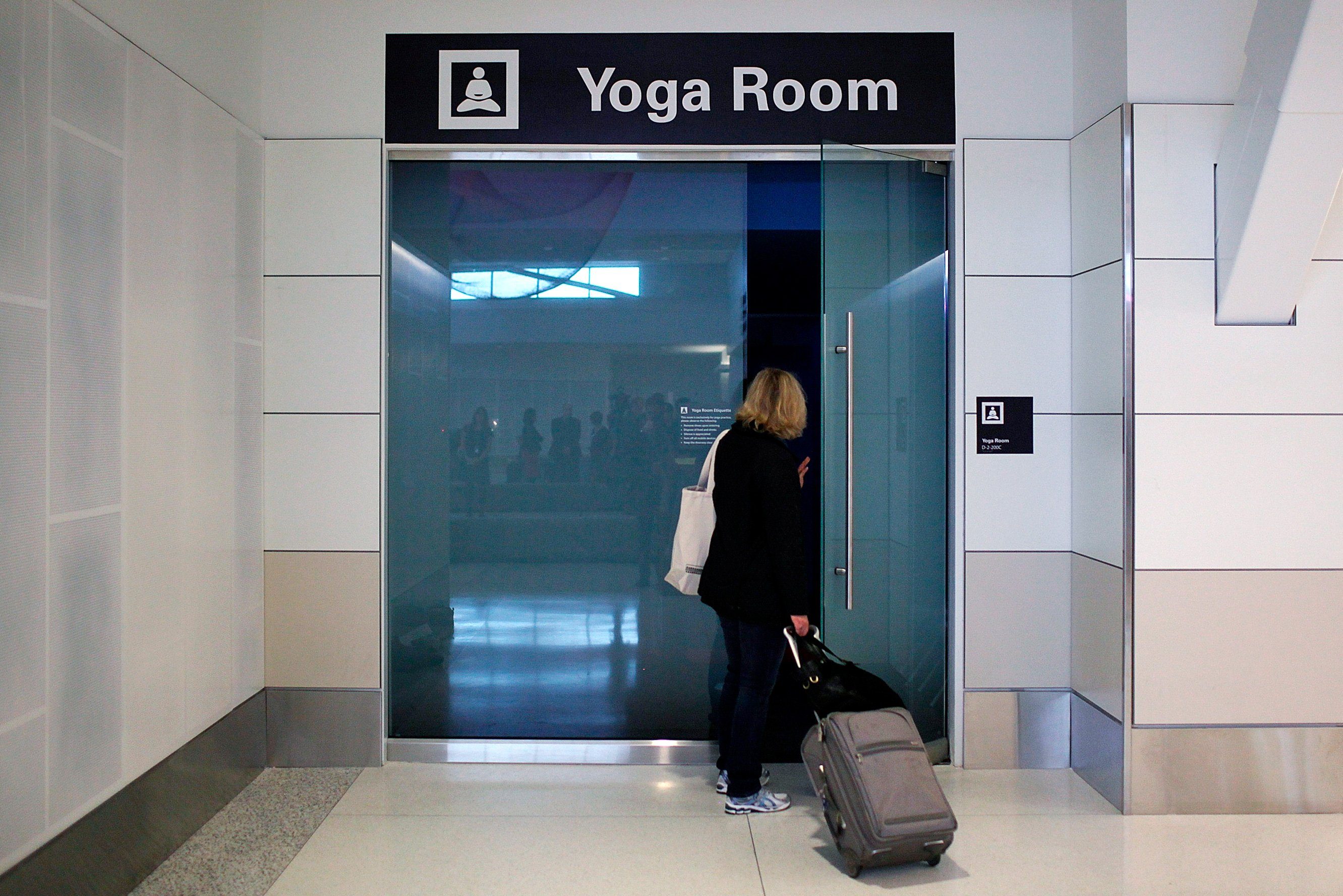 A traveler stops to look inside the new Yoga Room at San Francisco International Airport's terminal two on January 26, 2012 in San Francisco, California.