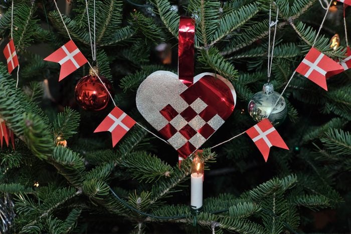 Hand-woven heart in a Christmas tree