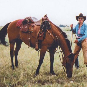 Janie (J.F.) and her beloved horse, Skookum Cat, in 1997