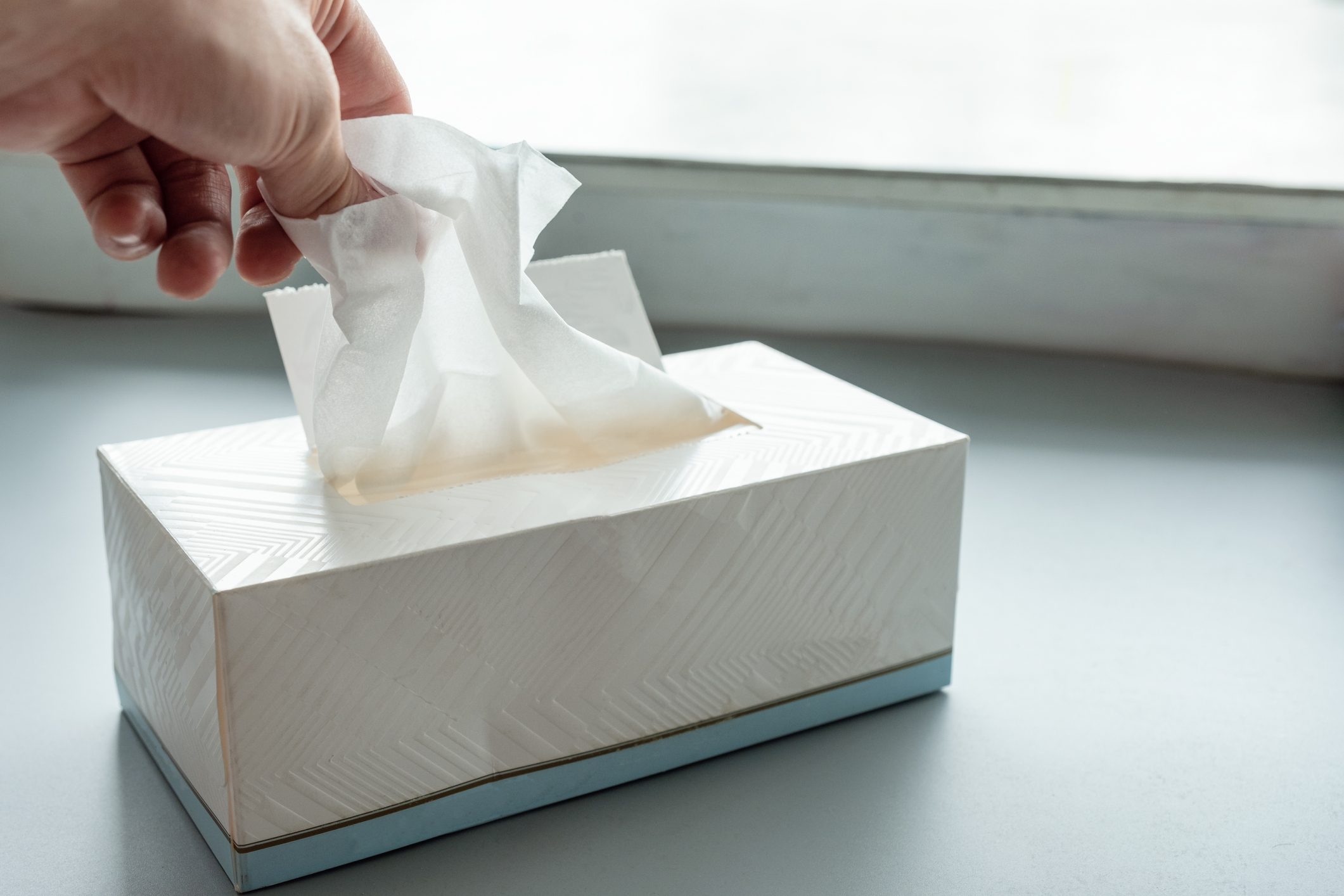 picking tissue out of tissue box