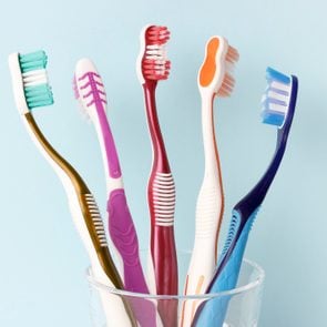 toothbrushes in cup