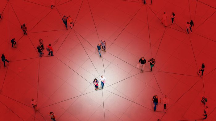 overhead view of people. connected by lines. red overlay.
