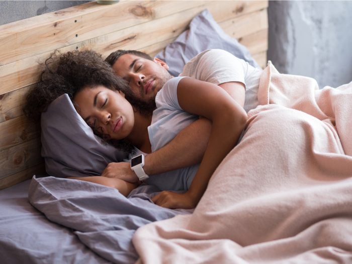 Couple sleeping in bed