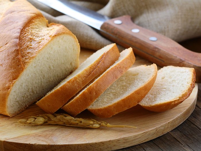 Stale bread hack - loaf of white bread sliced